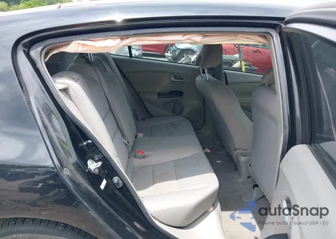 2012 Honda Insight from USA, damaged, VIN JHMZE2H36CS000448